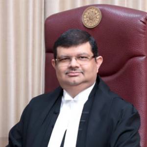 Hon’ble Mr. Justice Tejas Karia